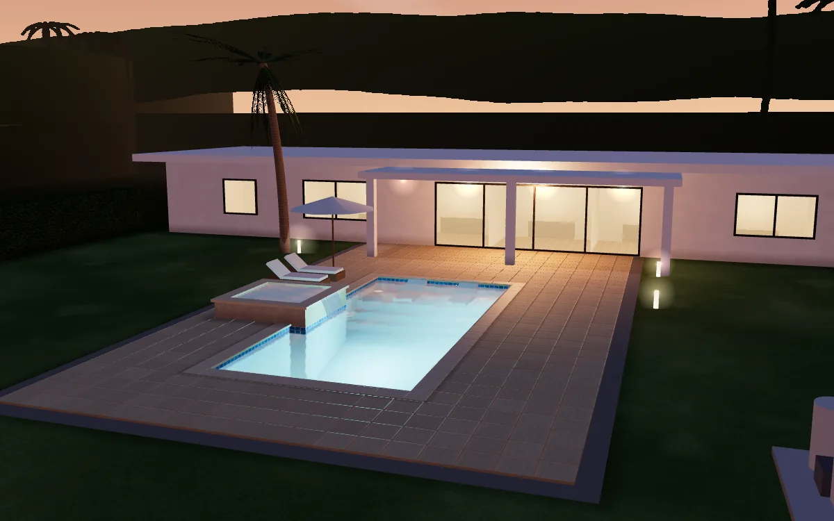 The finished pool at dusk: a raised spa spilling into the pool, in-pool loungers on the sun shelf, lights glowing under the water
