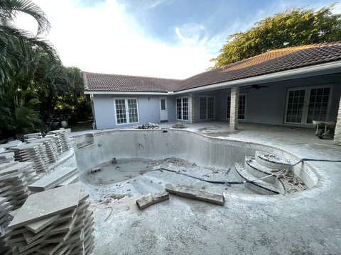 Old steps and deck broken out during the demolition stage